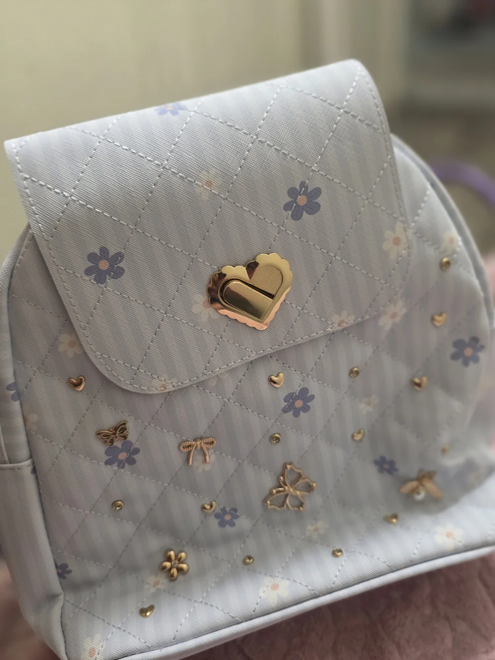 Women’s Light Blue Floral Quilted Backpack with Gold Accents